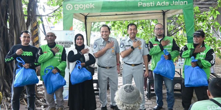 Kolaborasi Budaya Safety di Jalan Raya, Jasa Raharja Hadir di Tengah Komunitas Ojol Rawa Buaya, Jakarta